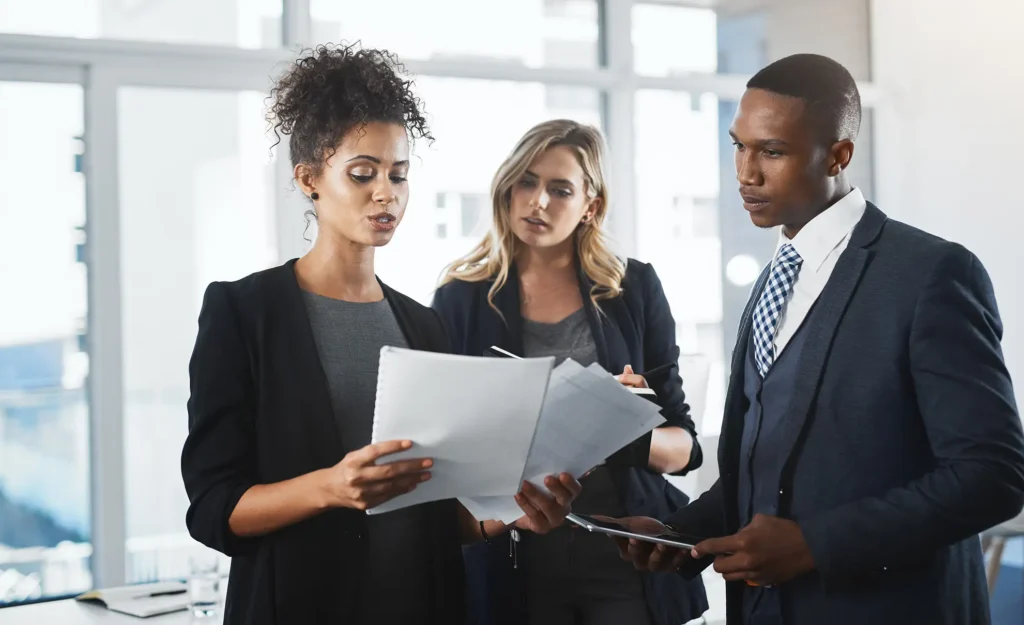 Corporate, teamwork and documents with business people in office for legislation